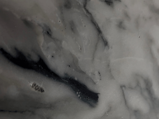 Damaged marble with deep scratches